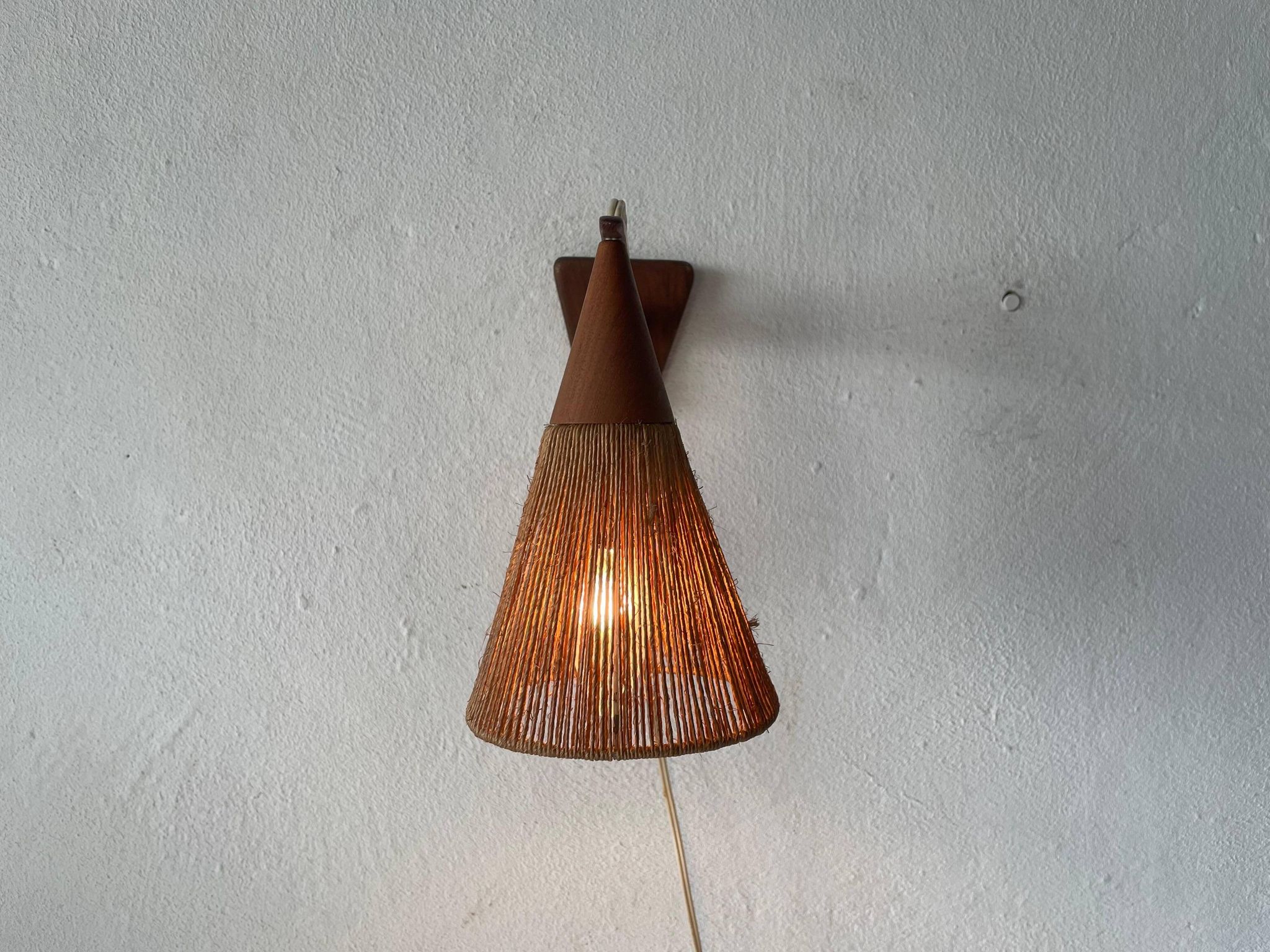 Teak wall lamp with natural ropes by Ib Fabiansen for Fog & Mørup, 1960s, Denmark.
