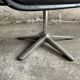 Wilkhahn Delta lounge chair in black leather with polished aluminum base and footrest (1970s)