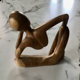 Pensive man wooden statue