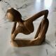 Pensive man wooden statue