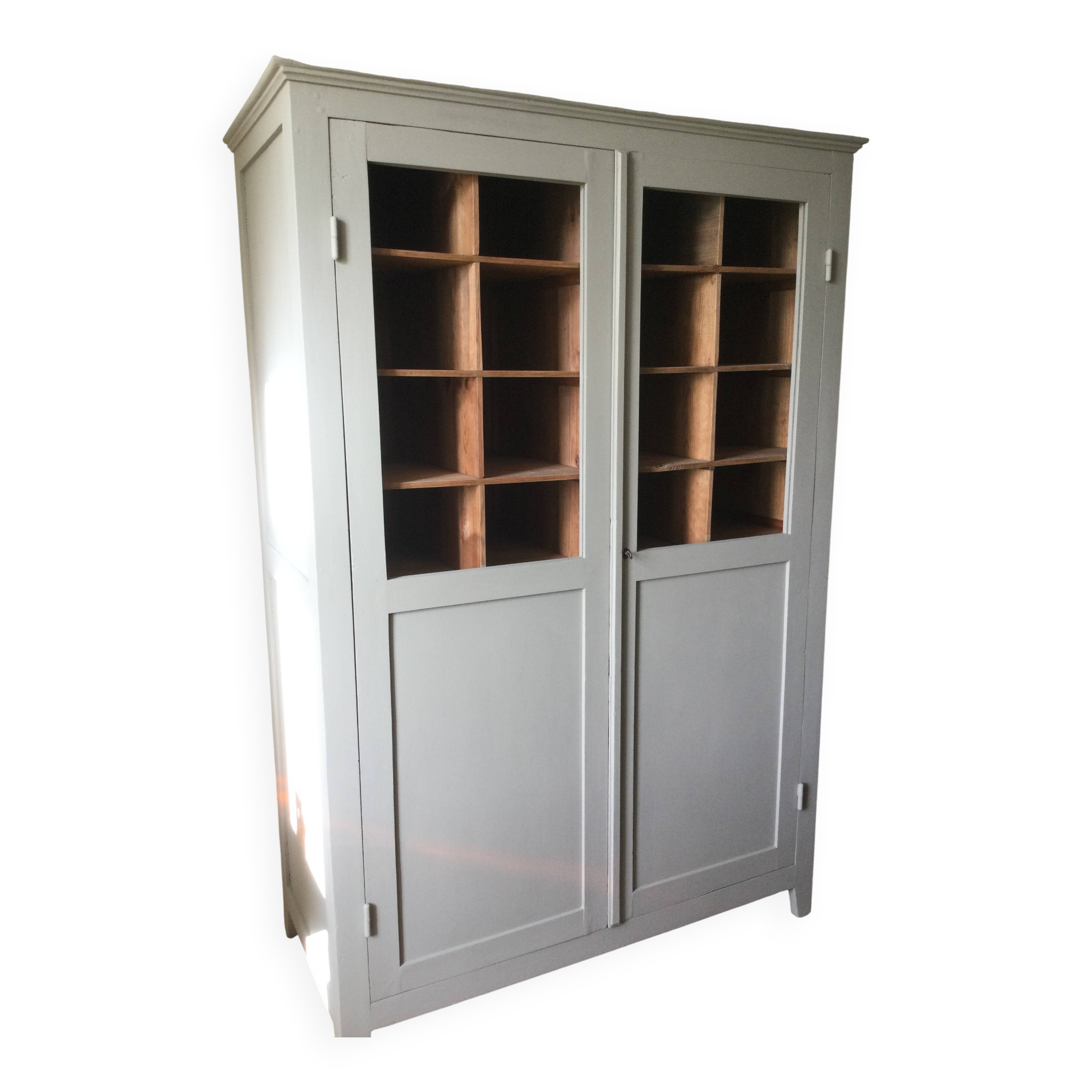 Antique Parisian wardrobe with interior compartments.