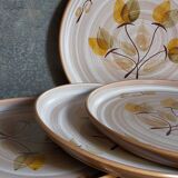 Six Niderviller stoneware plates with vintage plant décor