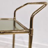 Golden metal dessert with tinted glass tops