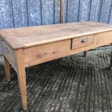 Antique solid cherry farmhouse table with 3 drawers and 1 pull out.