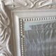 Large mirror with molding skated in gray 146 x 93 cm