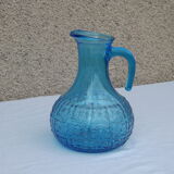 Set of jug and 10 blue glass goblets with floral motifs