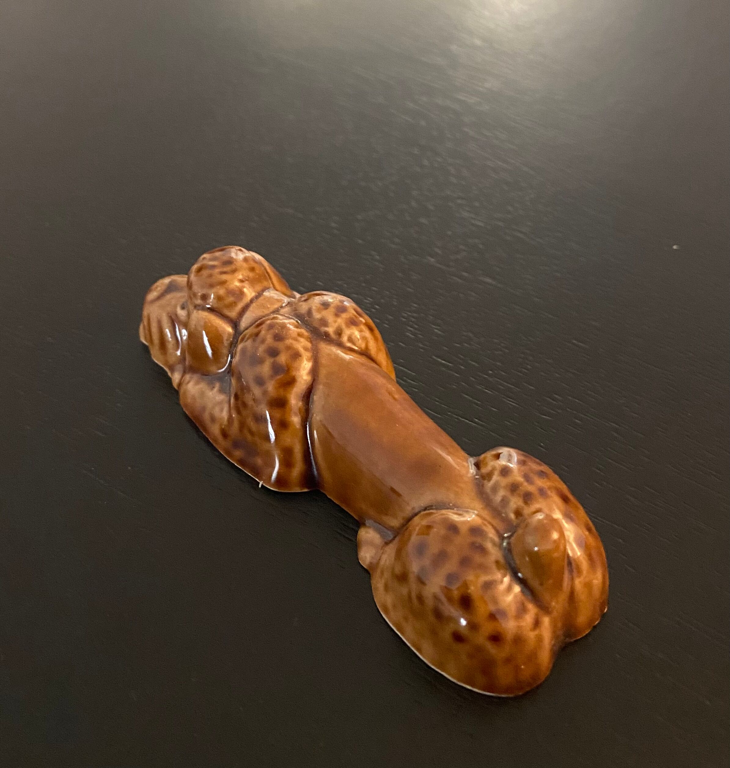 10 ceramic knife holders in the shape of a recumbent poodle