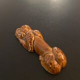 10 ceramic knife holders in the shape of a recumbent poodle