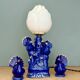 Vintage blue ceramic lamp with its birds.