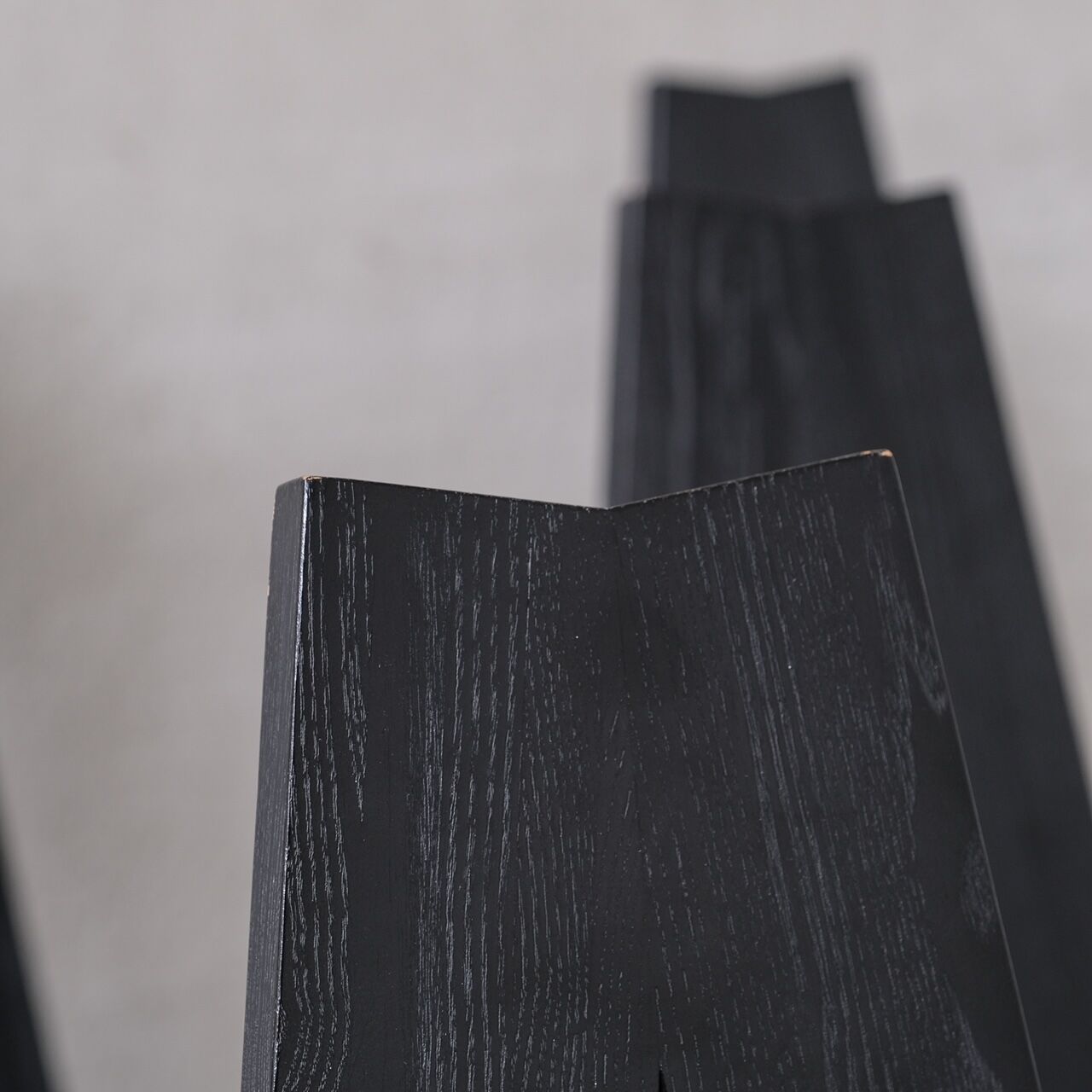 Set of six black dining chairs