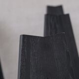 Set of six black dining chairs