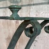 Console in glass and antique patinated metal