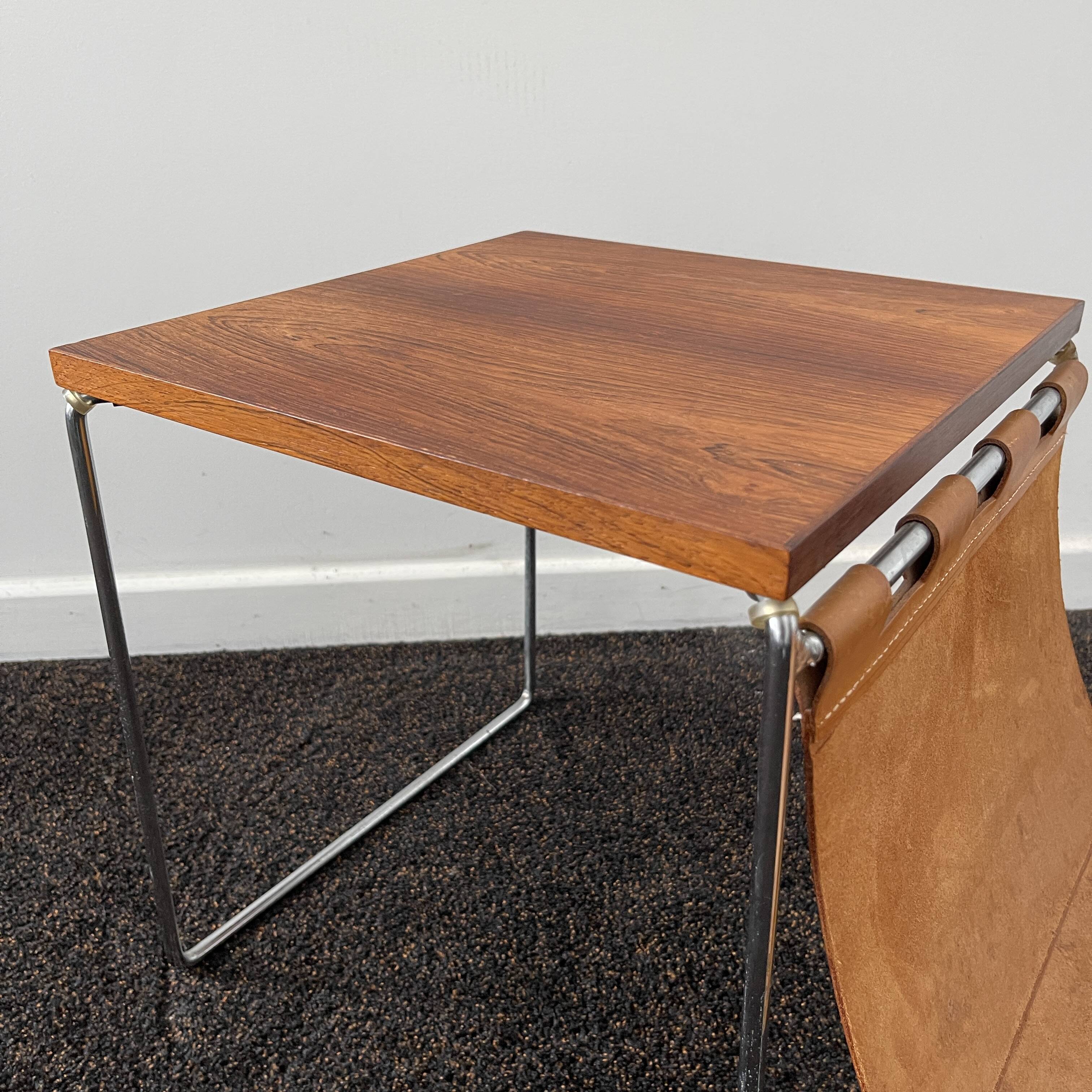 Vintage side table / newspaper holder in leather, chrome-plated steel rosewood, ca 1970