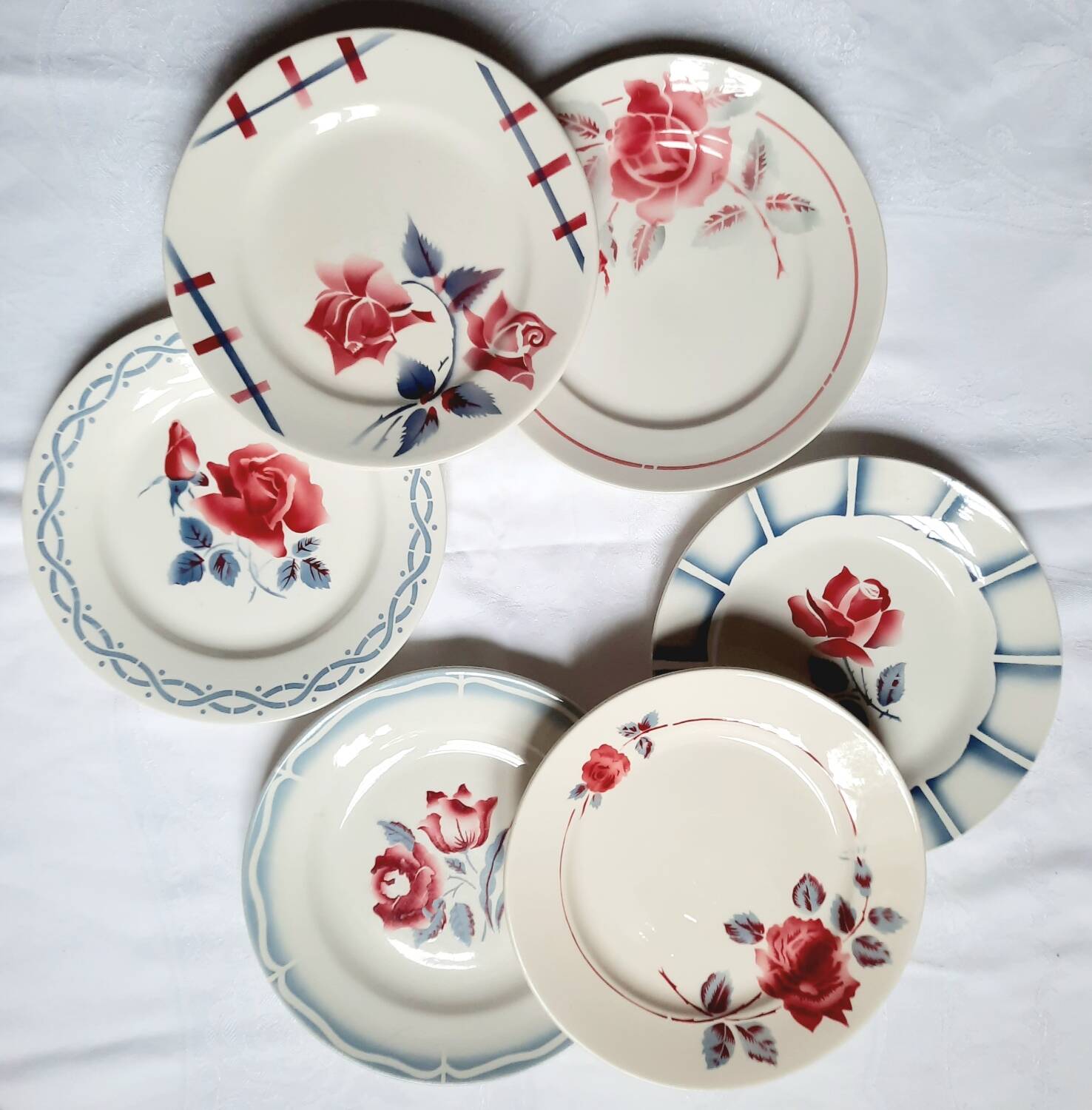 Old mismatched earthenware dinner plates