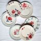Old mismatched earthenware dinner plates