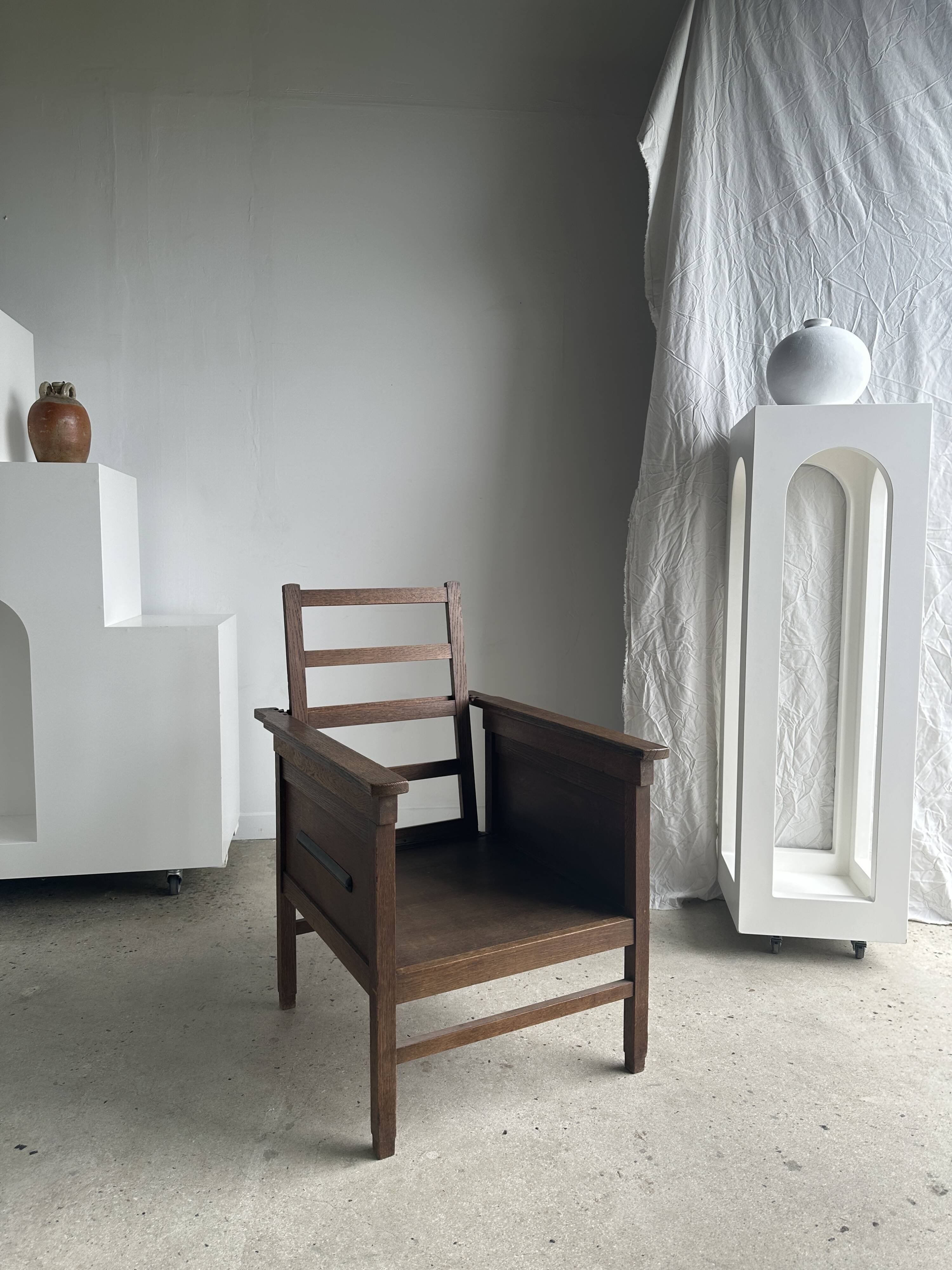 Large wooden armchair with adjustable reclining back