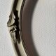 Oval frame in weathered wood