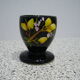 Black egg cup with hand-painted floral decoration