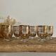 6 verres à liqueur dorés