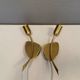 A set of "tulip" wall lamps in golden colored metal. Danish 1970-80s