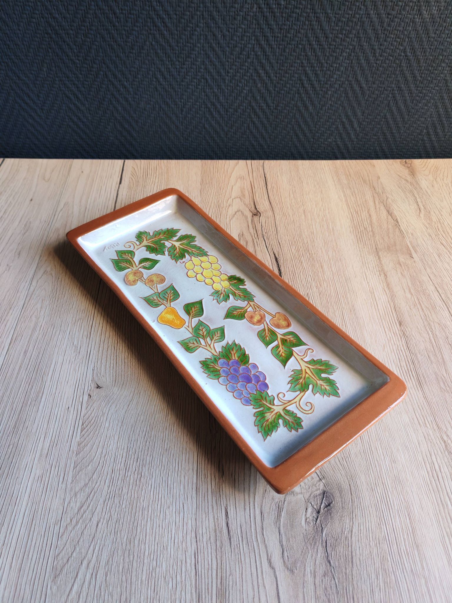 Terracotta plate signed P.Boy, glazed artisanal ceramics.