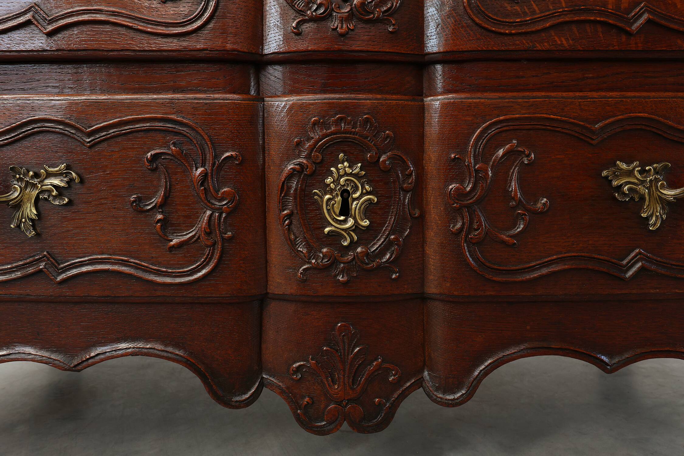 French 18th Century hand crafted oak chest of drawers in Louis XV style