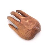 Empty wooden pocket in the shape of a hand, vintage