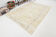 Tapis en beige délavé