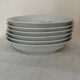 Set of 6 deep plates
