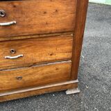 Antique 19th-century wooden chest of drawers with a marble top