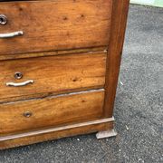 Antique 19th-century wooden chest of drawers with a marble top