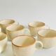 Set of 9 speckled ceramic coffee cups