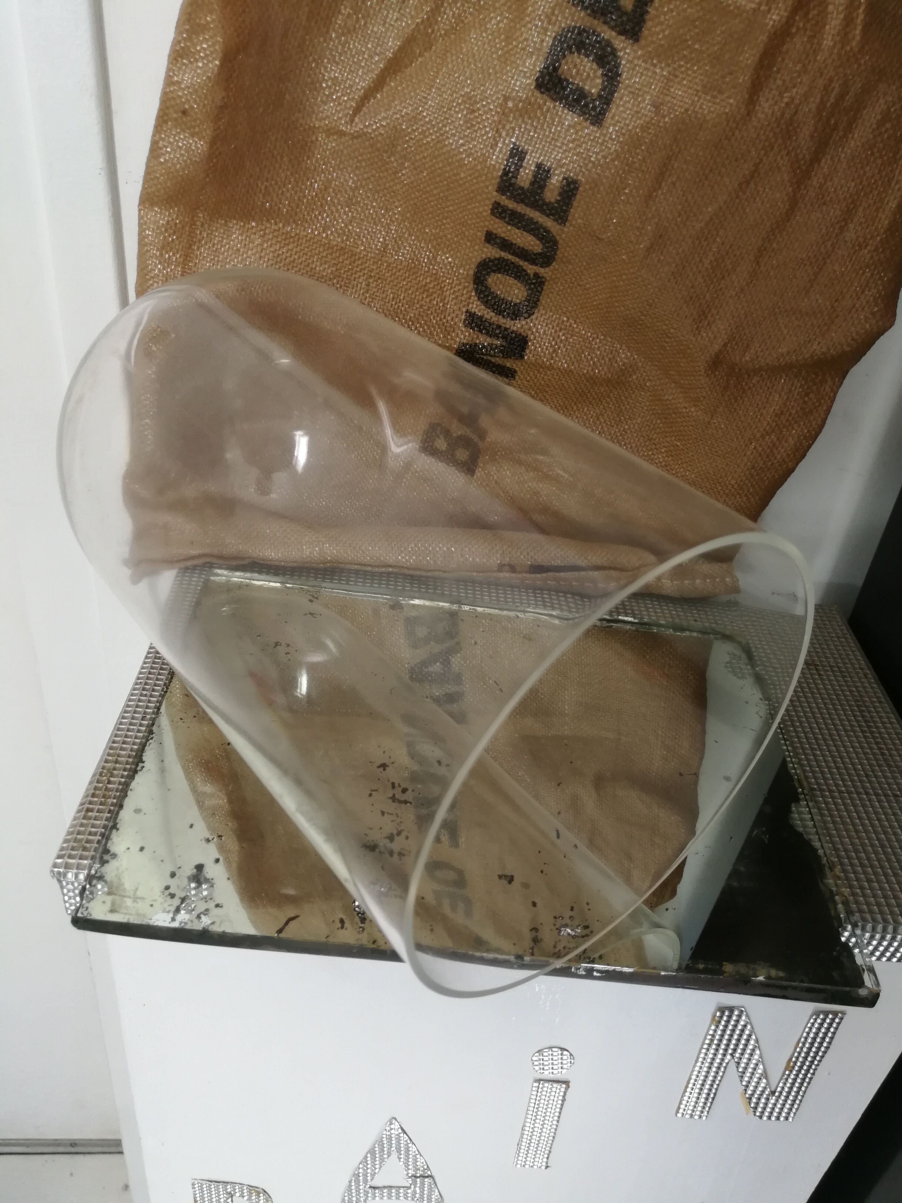 Plastic bell with mirror base