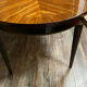 Louis XVI table has extensions in precious wood marquèterie