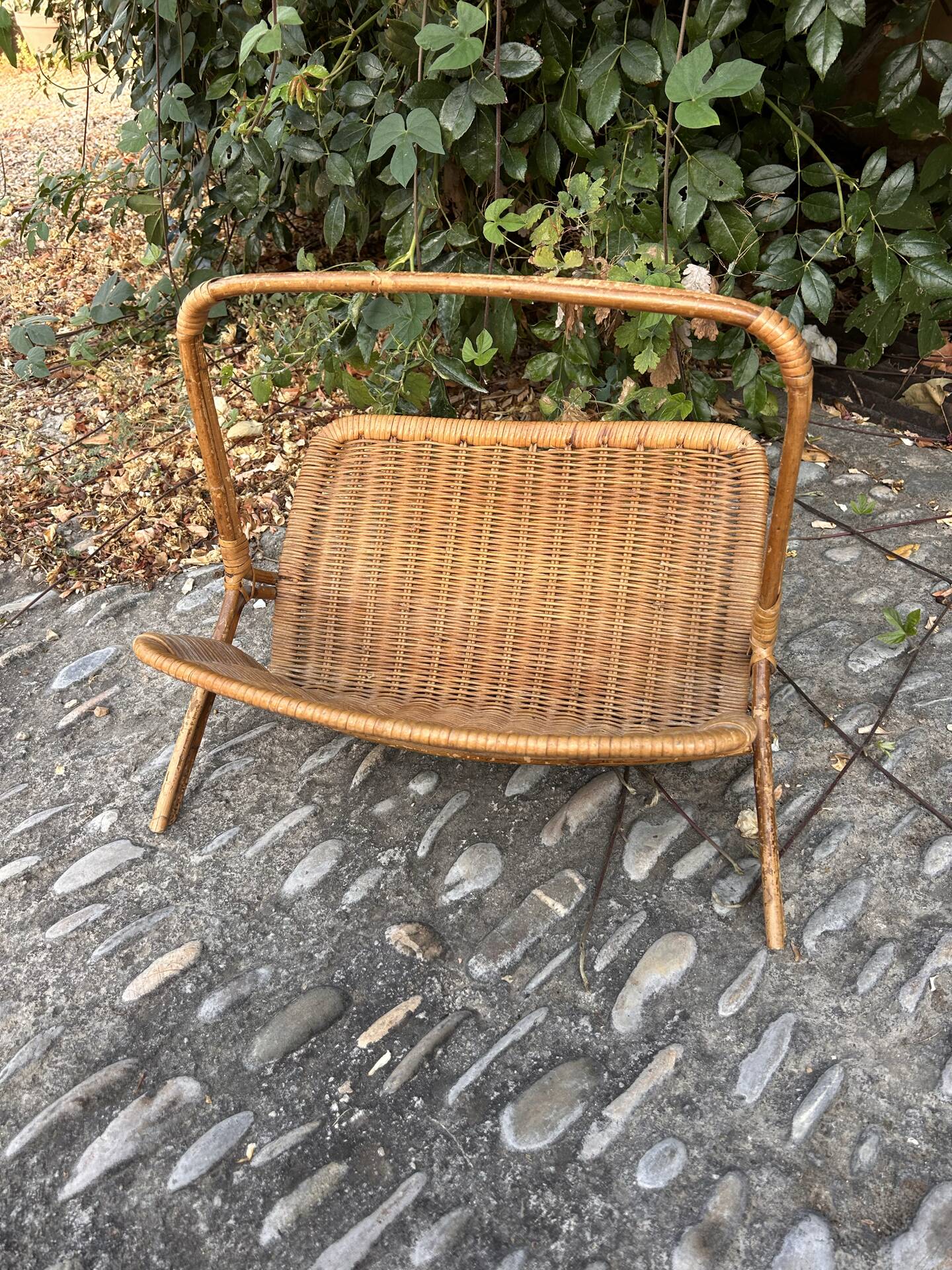 Rattan magazine rack