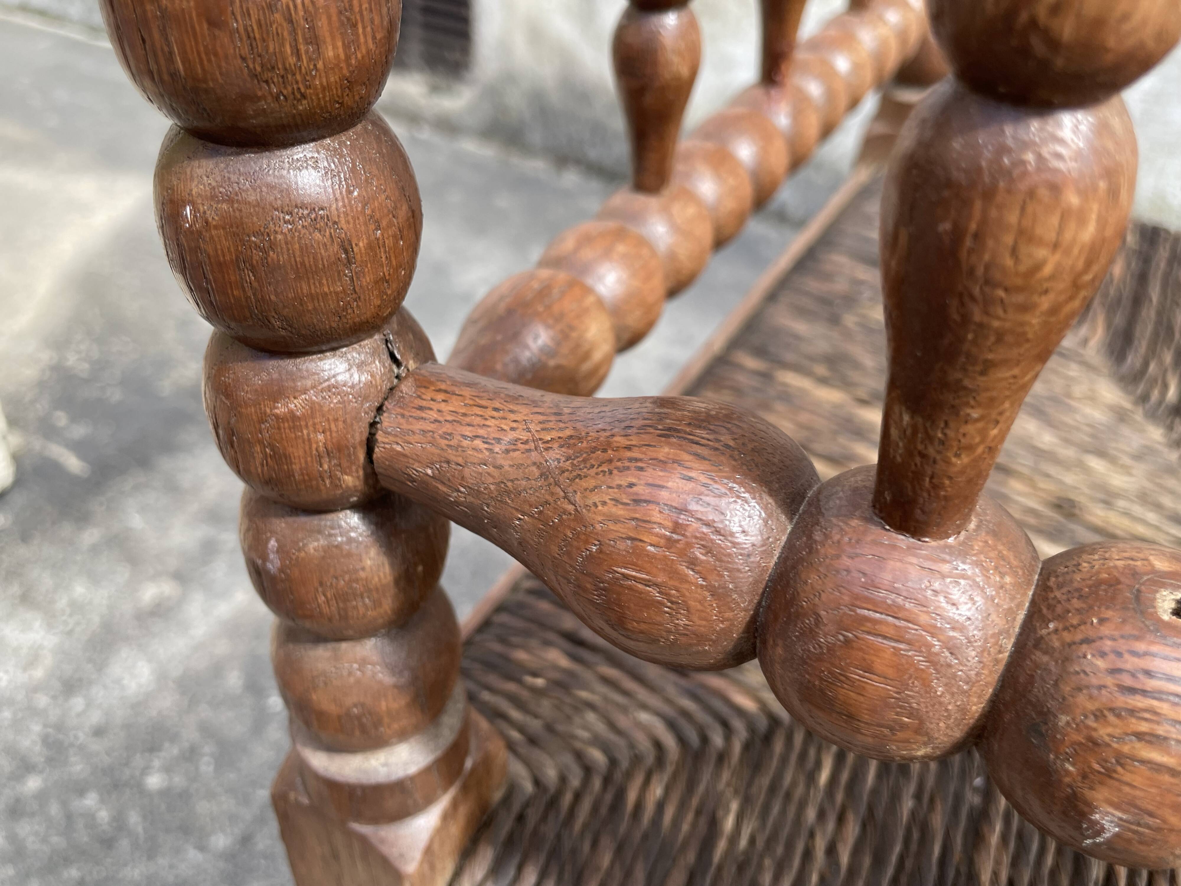 Antique Bobbin armchair with straw seat