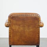 Sheep leather Art Deco design armchair finished with black piping