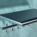 Minimalist coat rack, tubular chrome frame, 1980s Memphis style.