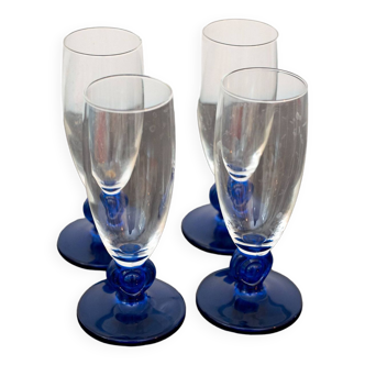 Set of 4 Flutes Blue Stemmed Glasses Made in France, by Luminarc Original base in blue molded glass P