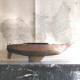 Vintage boat model in patinated metal