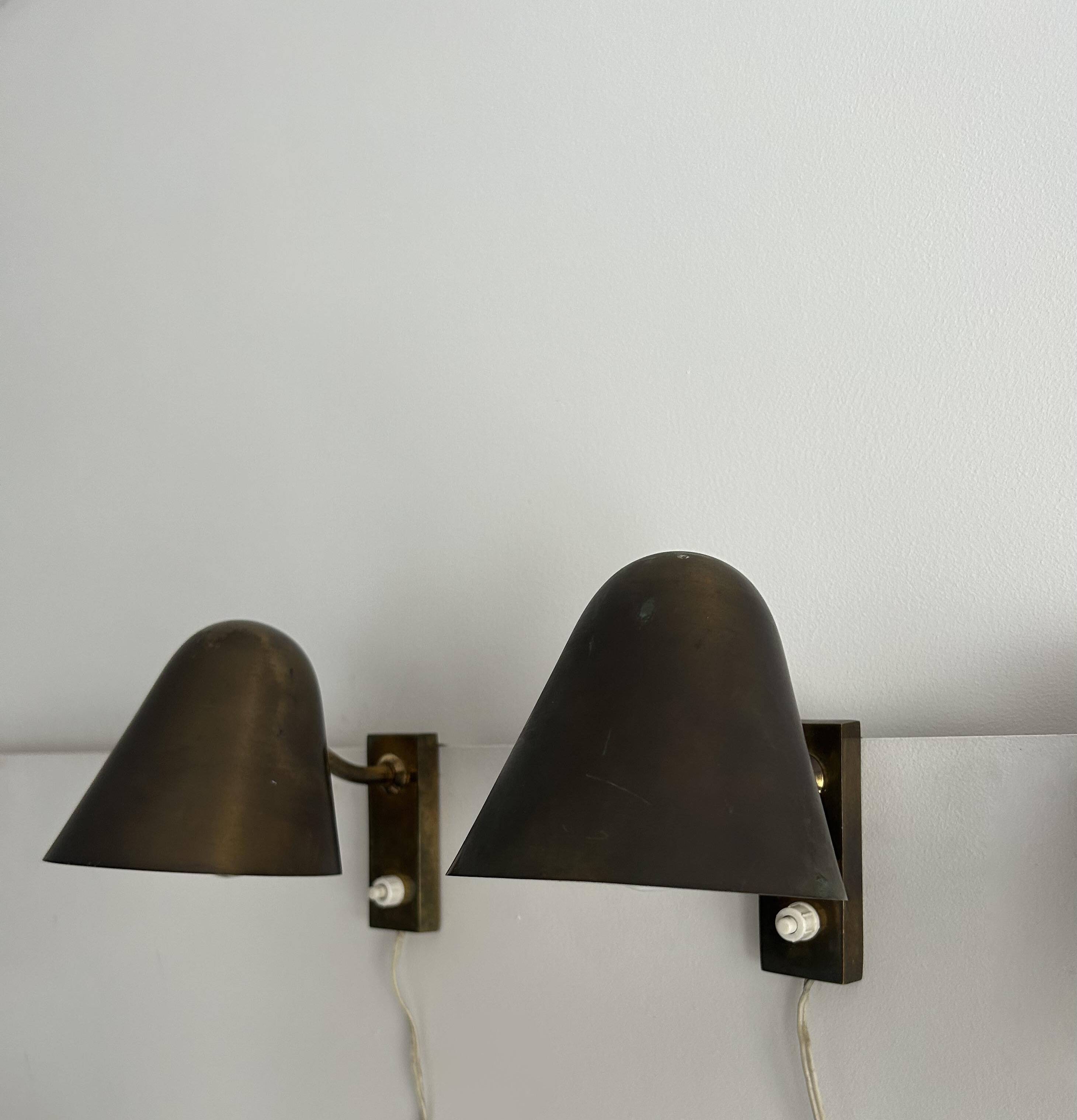 Pair of vintage adjustable wall lights, solid brass, France 1940