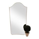 “Gendarme hat” mirror in gilded brass. 1960s.