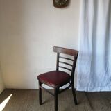 Set of 8 bistro chairs in vintage red wood and leatherette.