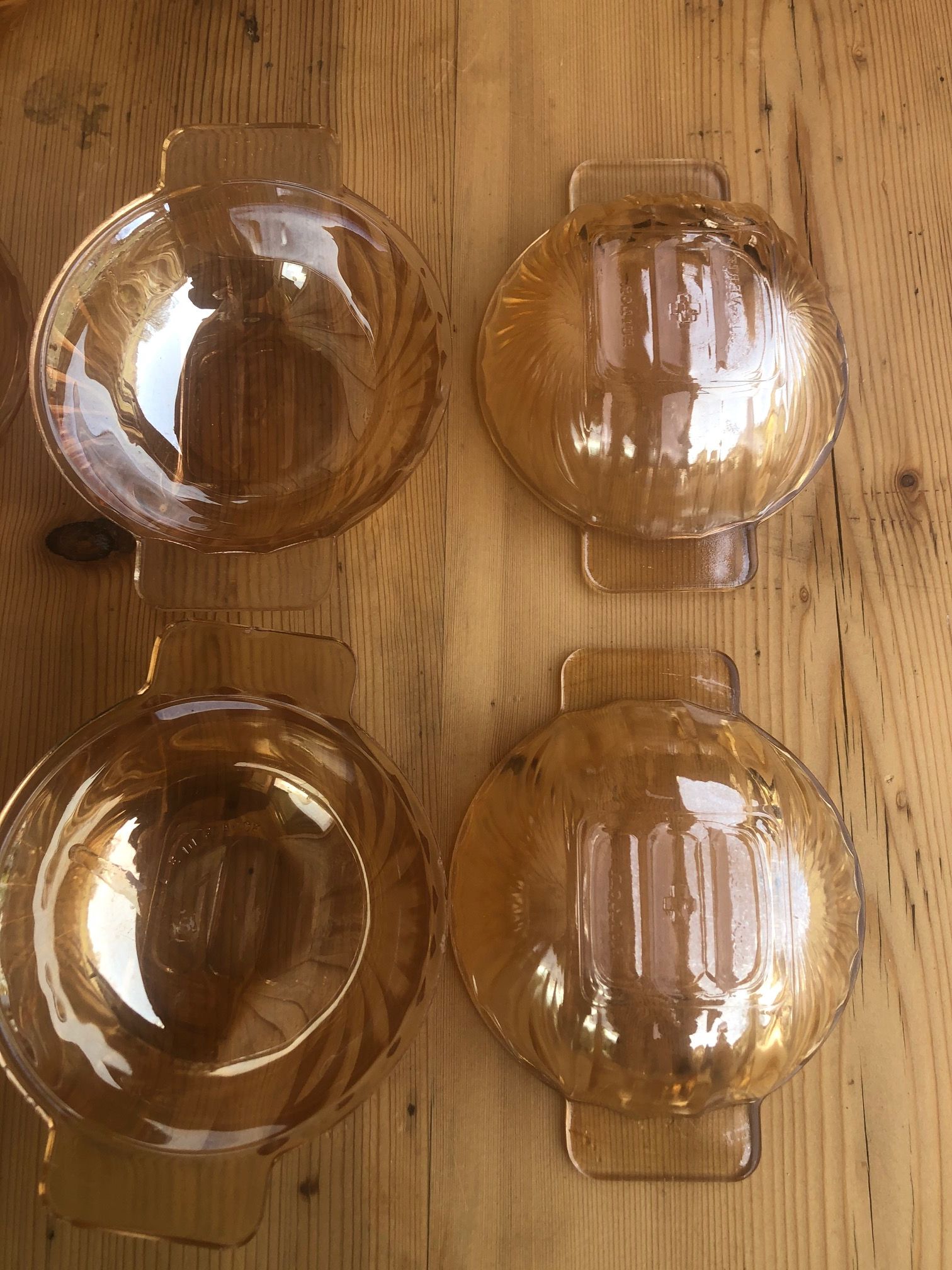 Huilor green cross cups stamped underneath. Very beautiful iridescent color as new