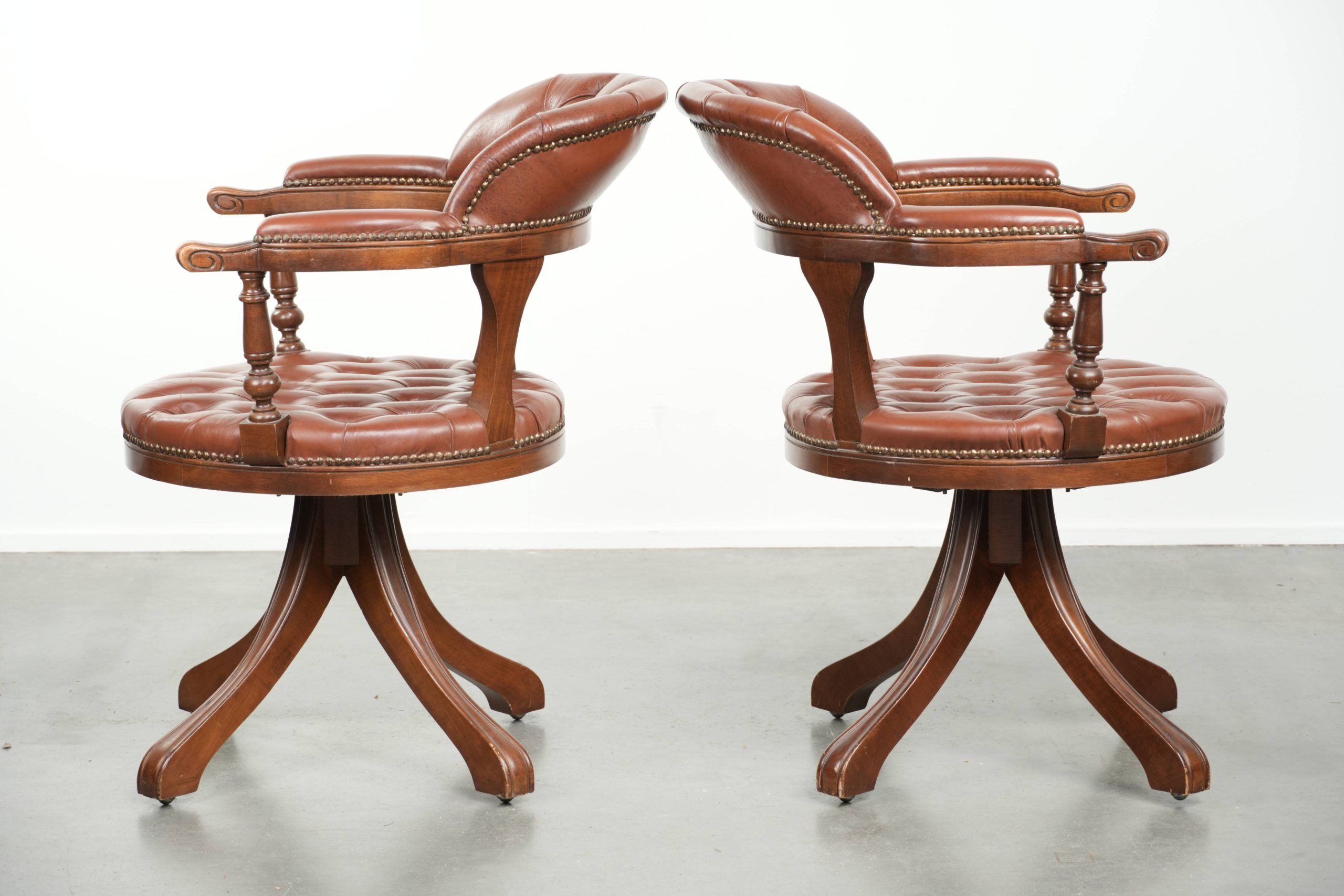 Set of 2 swivel cowhide English style chesterfield office chairs
