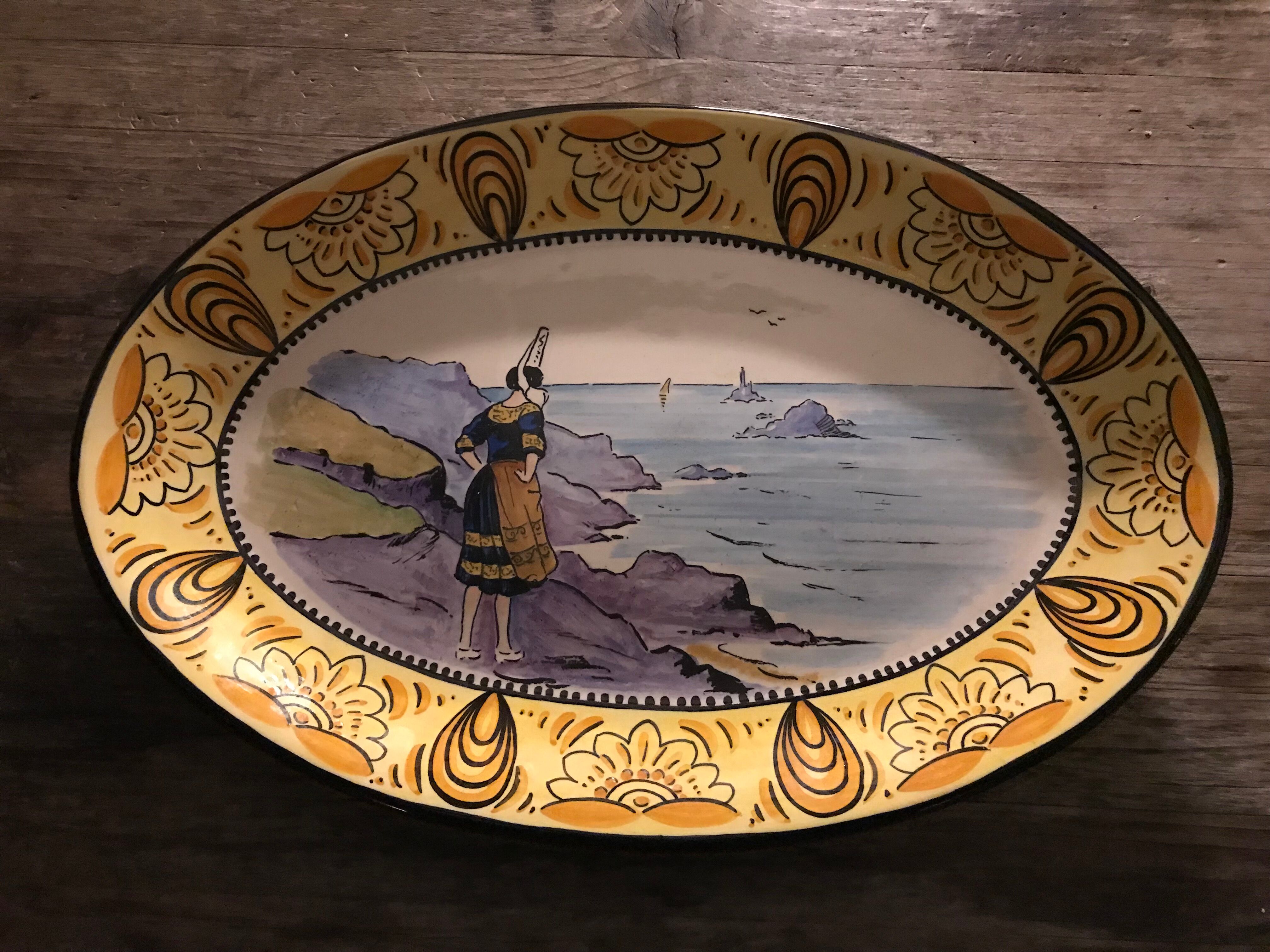 Old faience dish, Scéne Bretonne after Louis Suire and Masse Frères