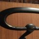 Wall coat holder in metal and wood 1960