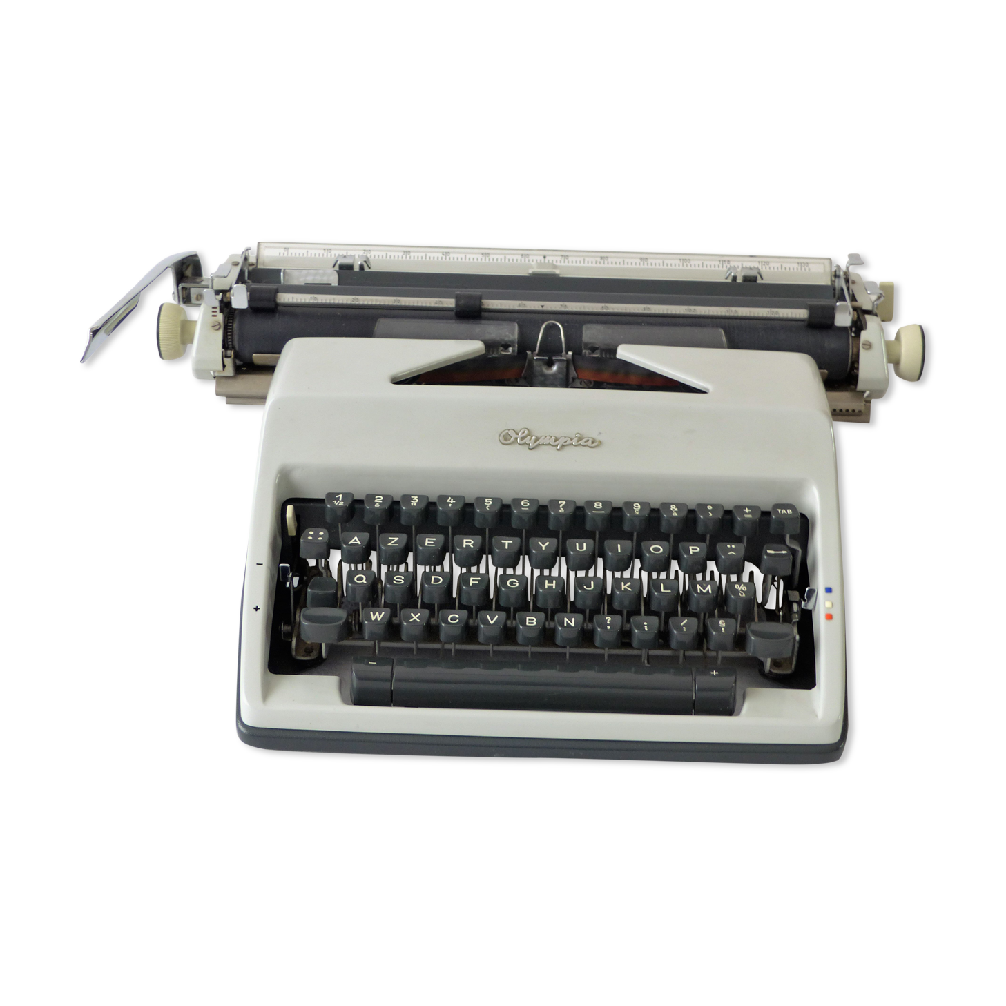 Olympia typewriter in his suitcase