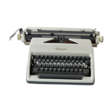 Machine à écrire Olympia dans sa valise
