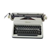 Machine à écrire Olympia dans sa valise